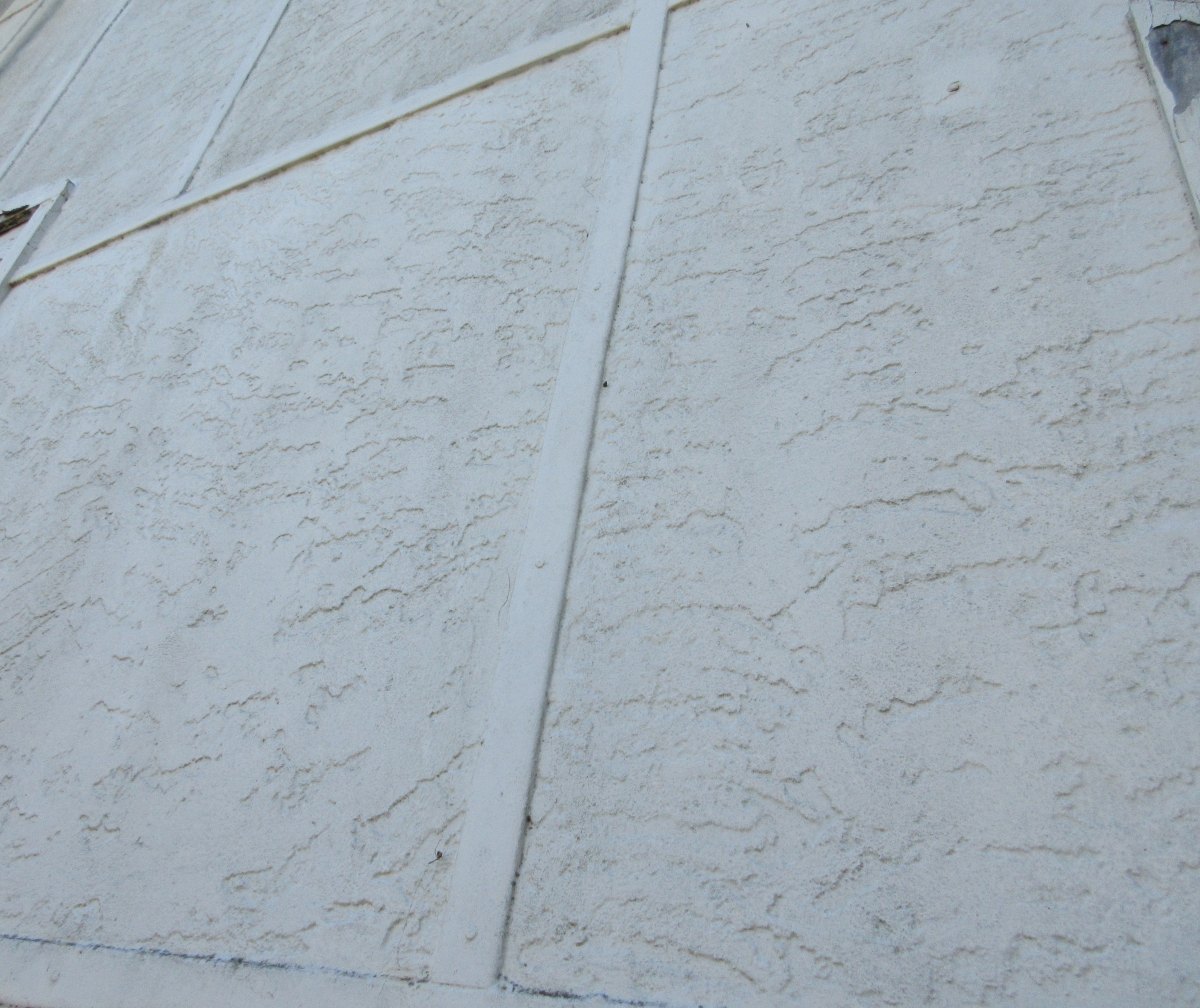 Render over AC exterior sheeting with AC battens